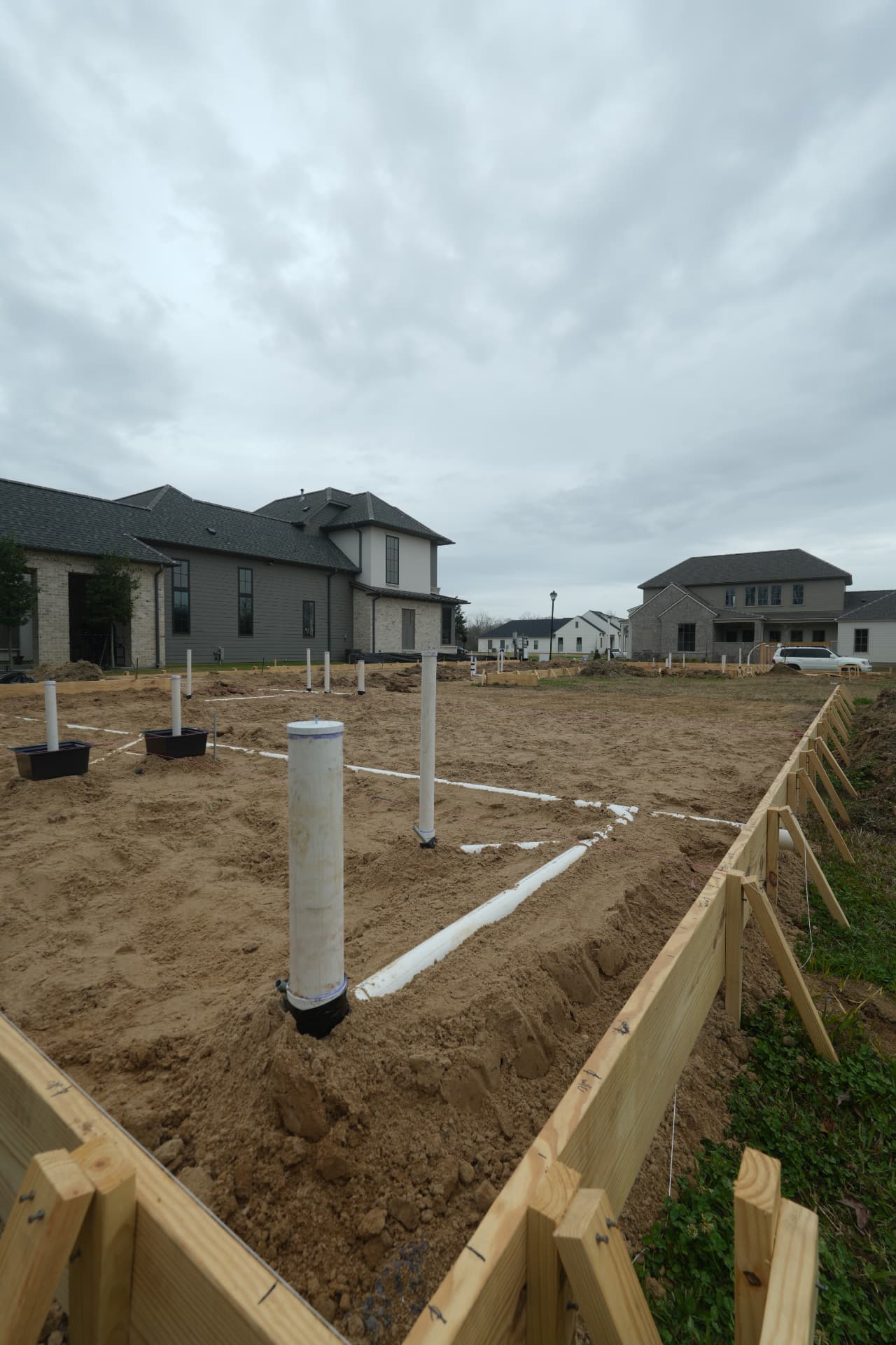 Plumbing rough-in and formwork set ahead of the 8646 Hattic Street foundation pour.