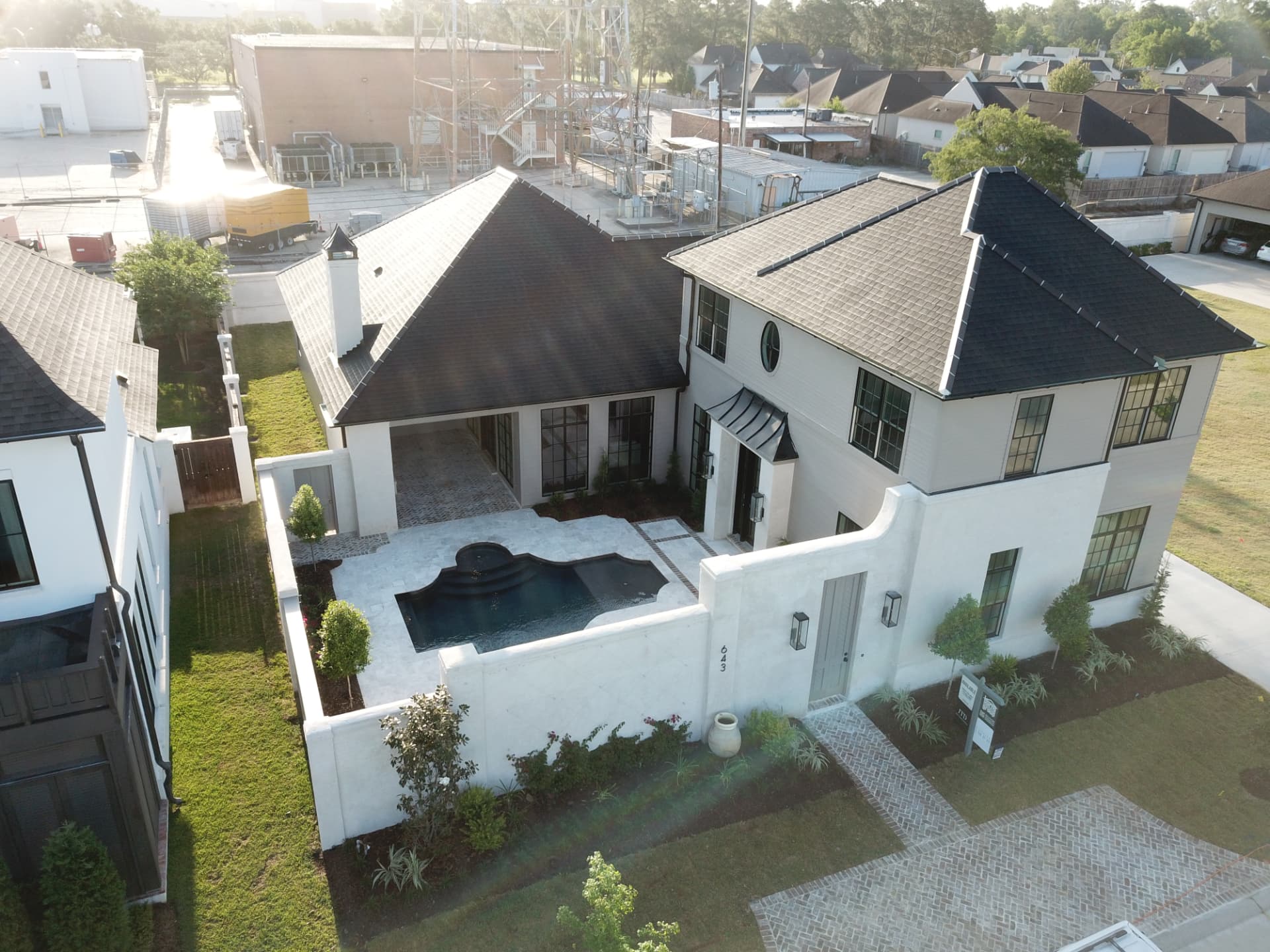 An aerial view of the completed home and its walled courtyard at 643 Adelia Lane.