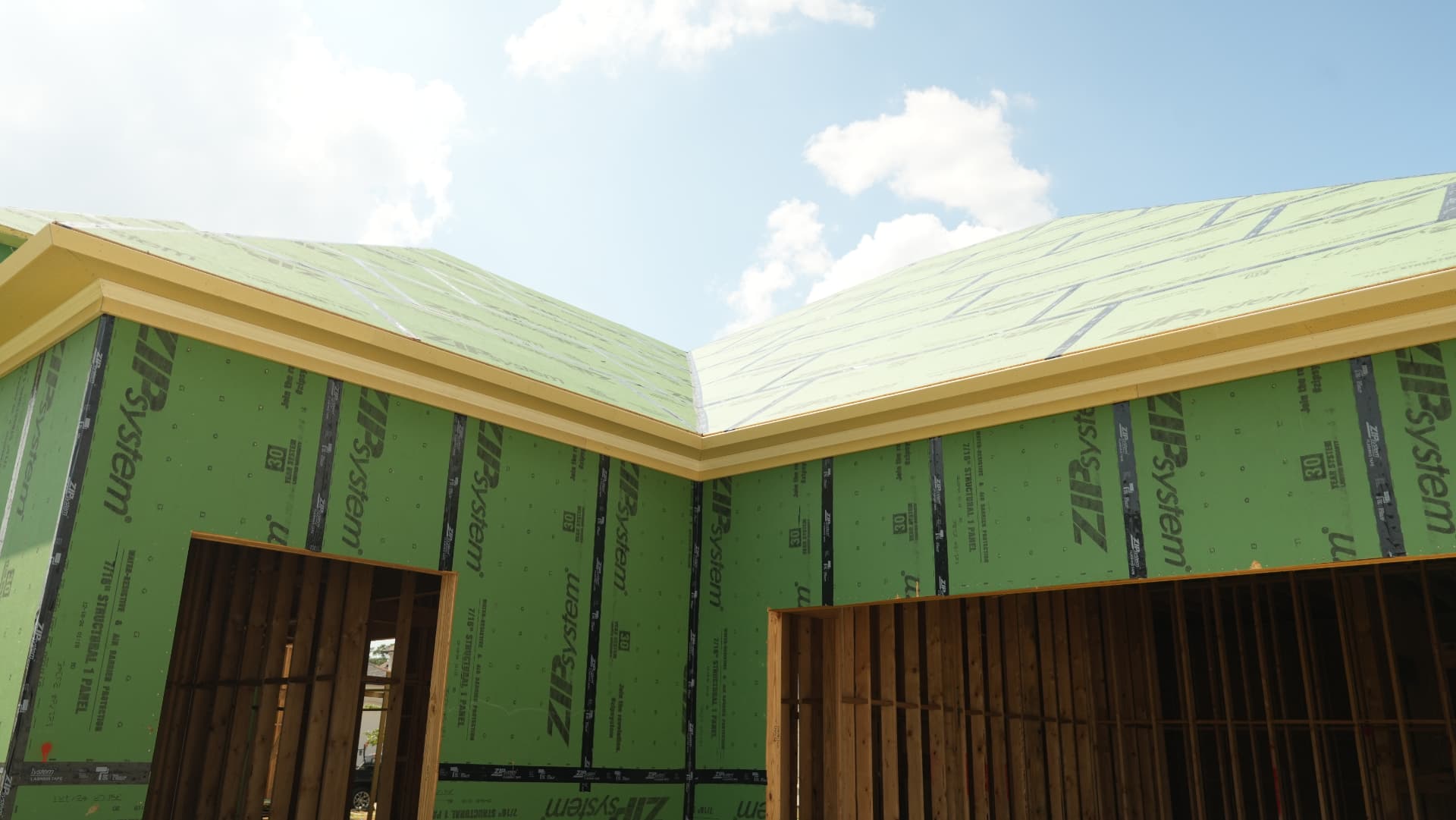 Eave detailing with vented soffit and fascia over the drainage plane.