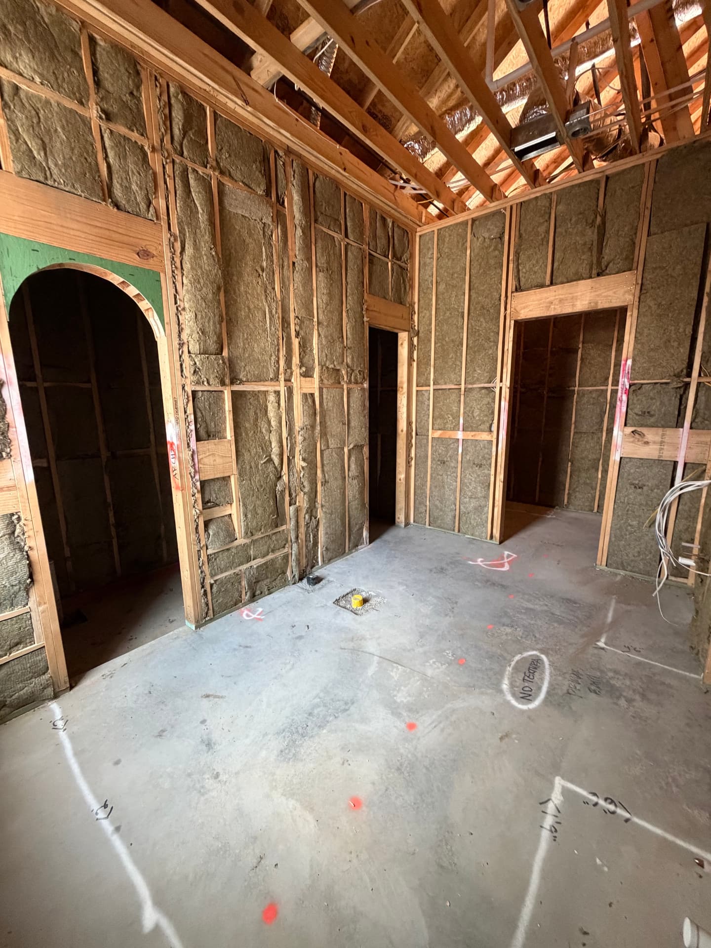 Mineral wool insulation installed ahead of drywall.